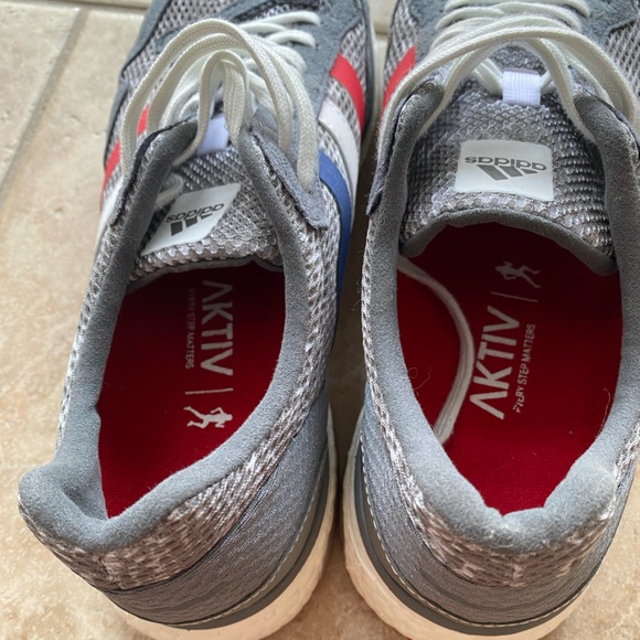 Red, white, and blue running shoes - Picture 2 of 3